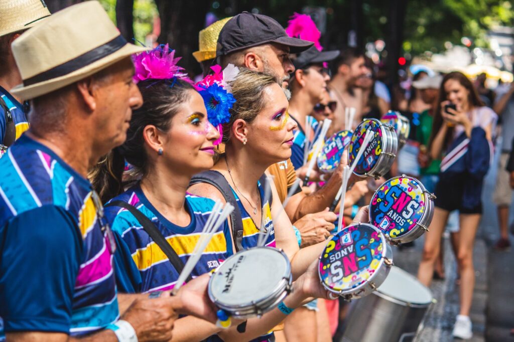 people holding tambourine