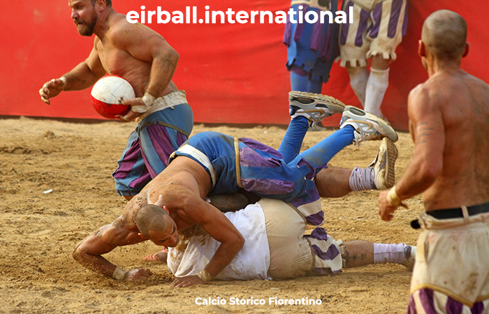 FLORENCE - JUN 24: Fighting players during Calcio Fiorentino match on June, 24,2012. Calcio fiorentino (calcio storico or calcio in costume) is an historic florentine game, origins of modern football